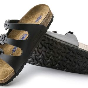 Black three strap Birkenstock’s size 38